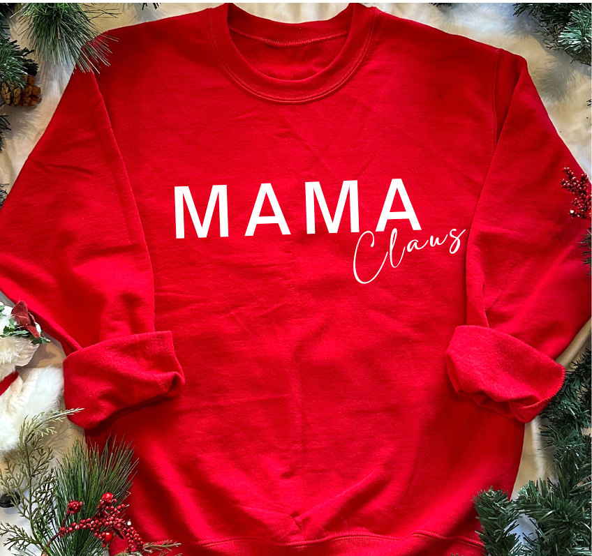 Red sweatshirt with 'MAMA Claus' text on a decorative background